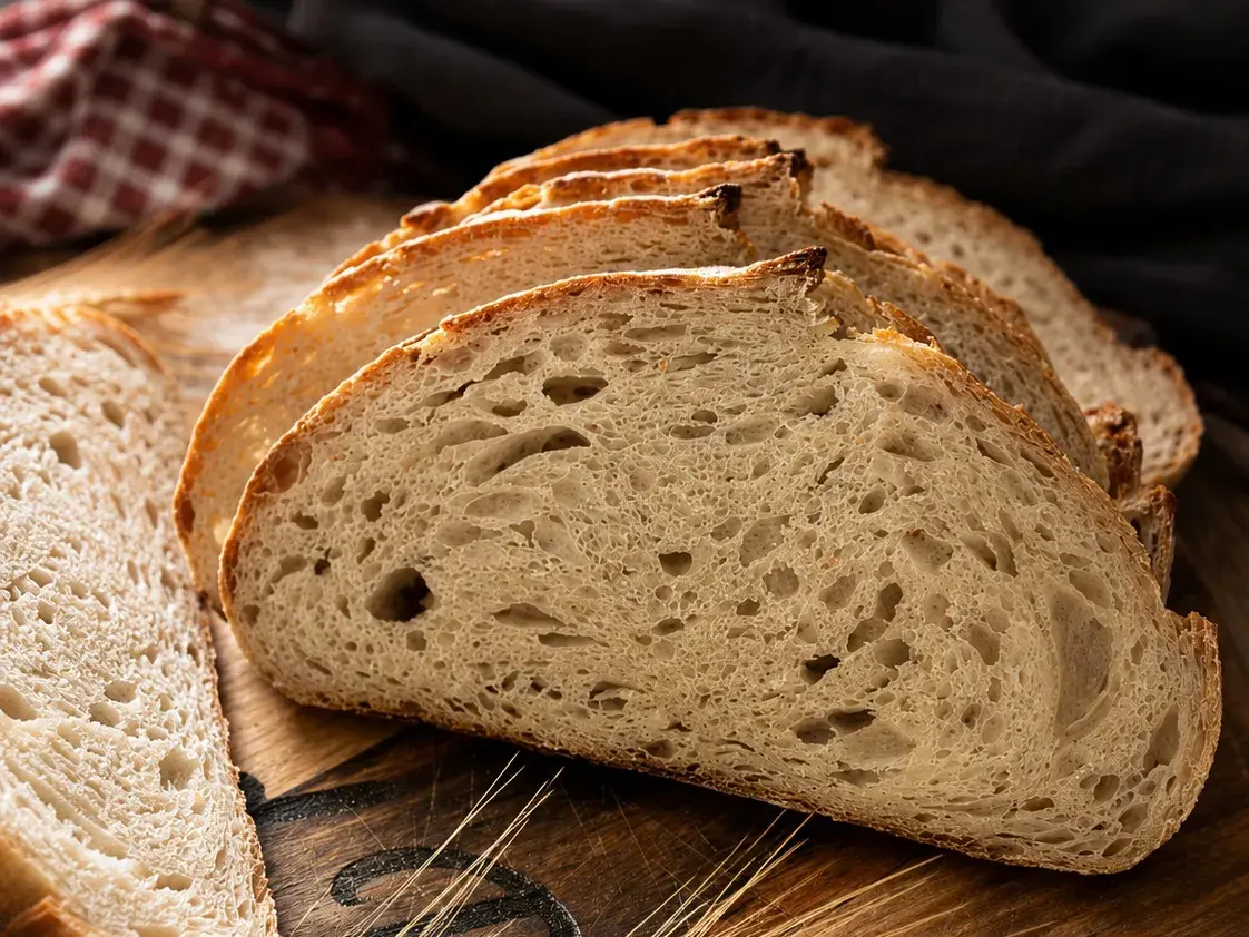 Sliced sourdough showing an open crumb